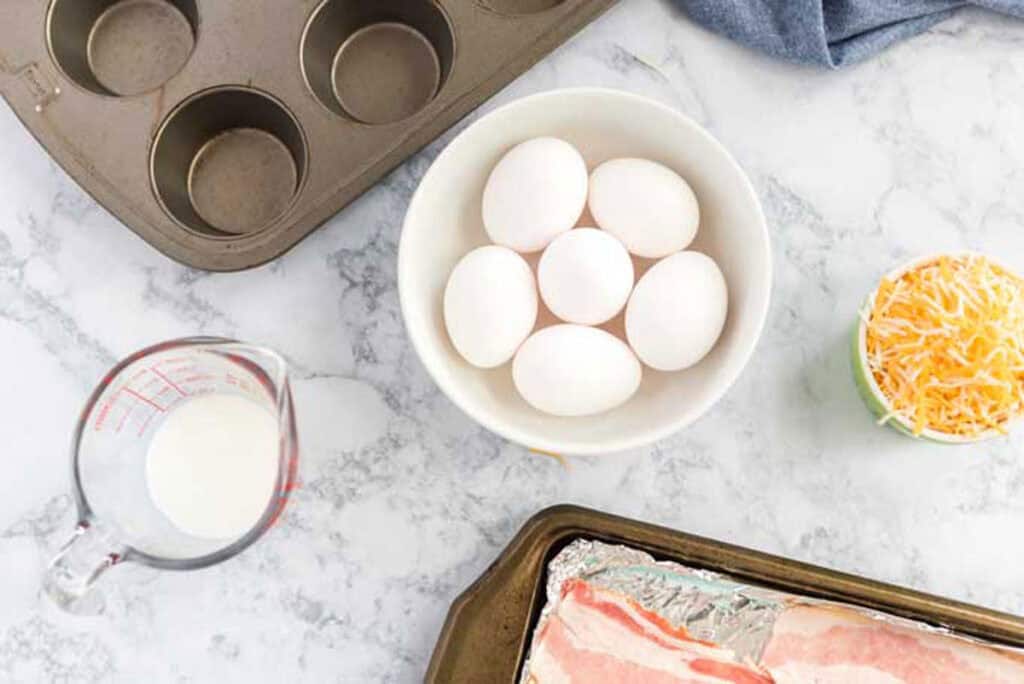egg muffin ingredients on marble counter