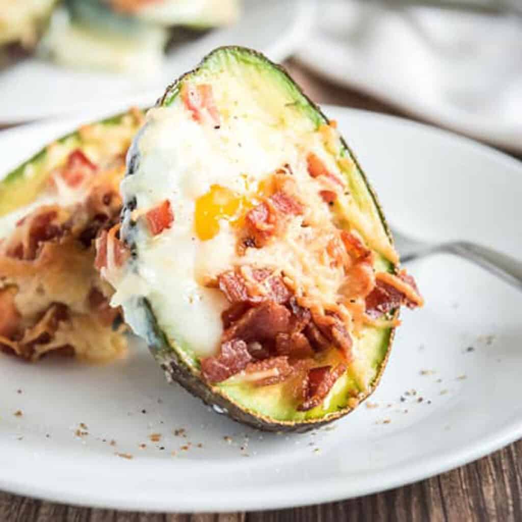 egg baked into avocado halves