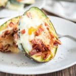 egg baked into avocado halves